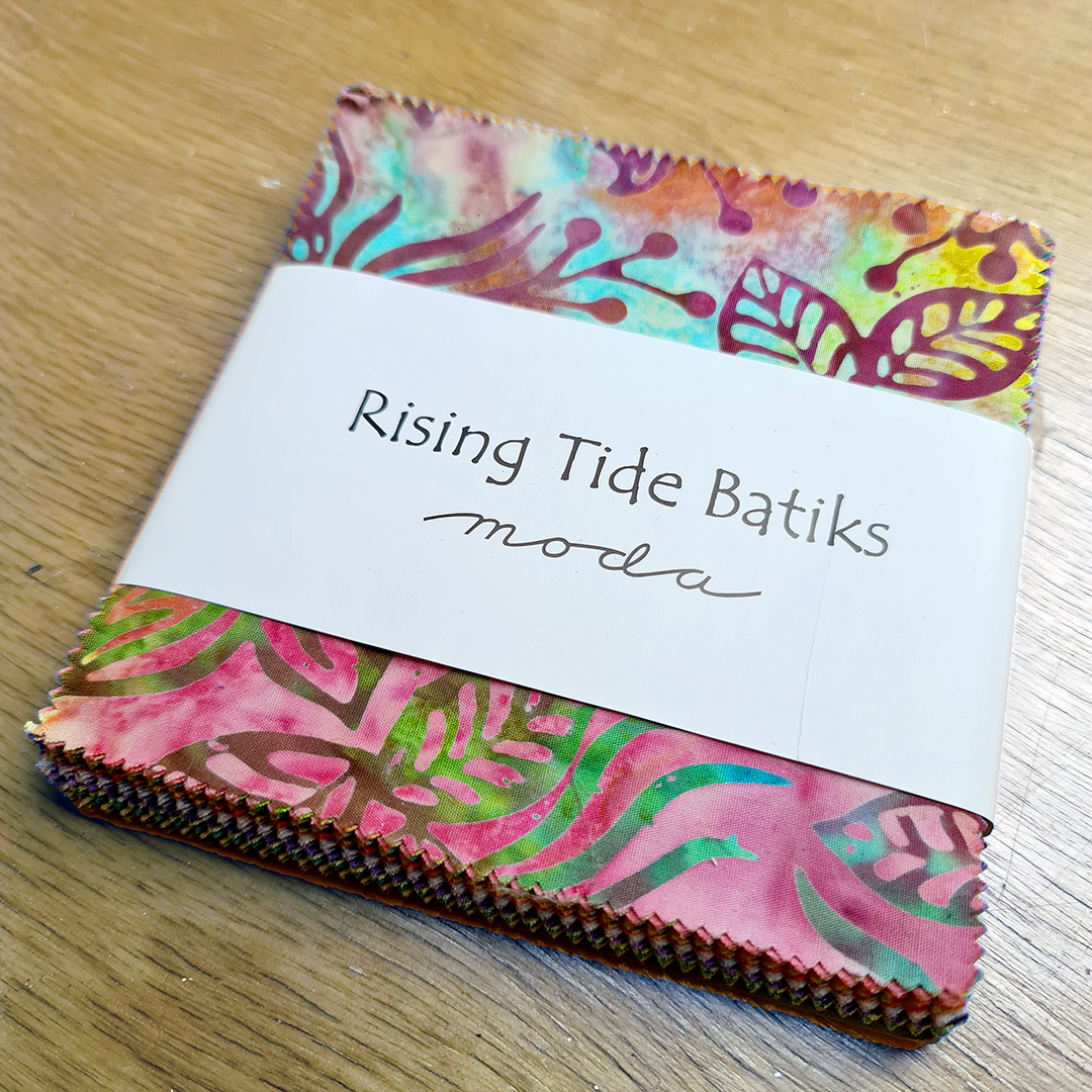 Image showing a charm pack of fabric.